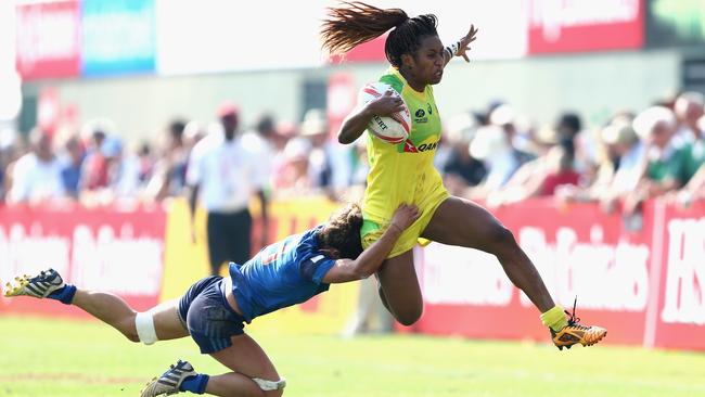 Ellia Green skips out of a tackle to score against France during last weekend’s Dubai rugby sevens.