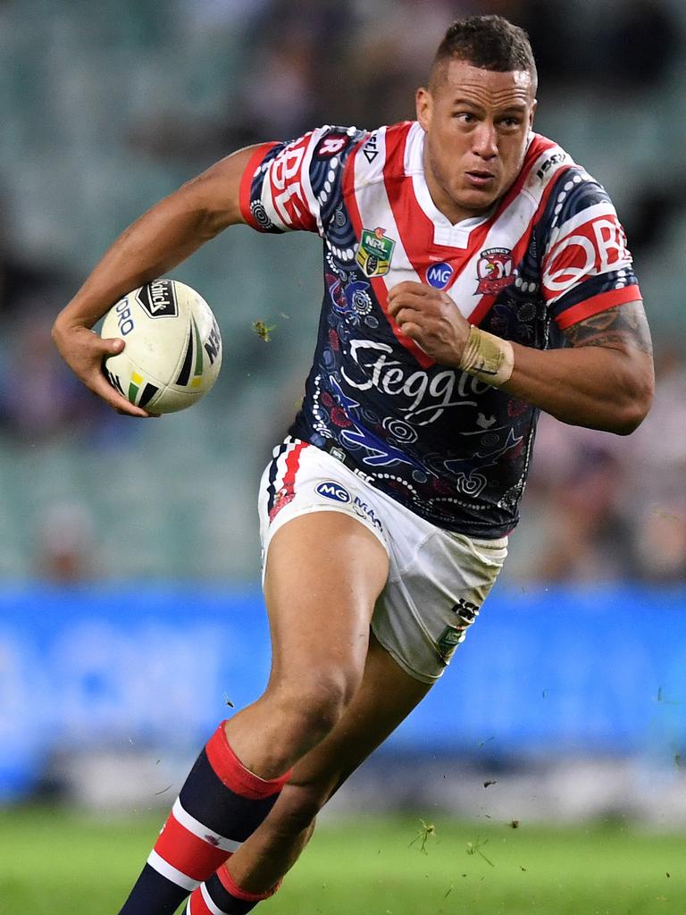 Kane Evans of the Roosters runs with the ball during the round 10 NRL match in 2017. Picture: AAP