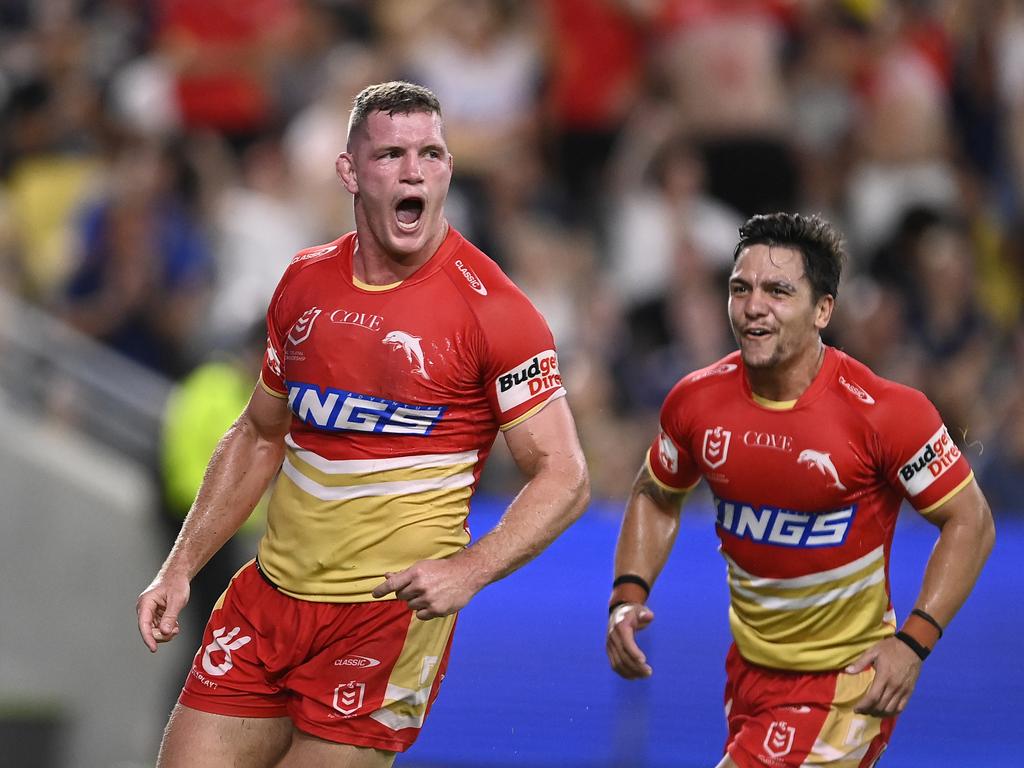 Tom Gilbert of the Dolphins celebrates after scoring a try. Picture: Ian Hitchcock/Getty Images