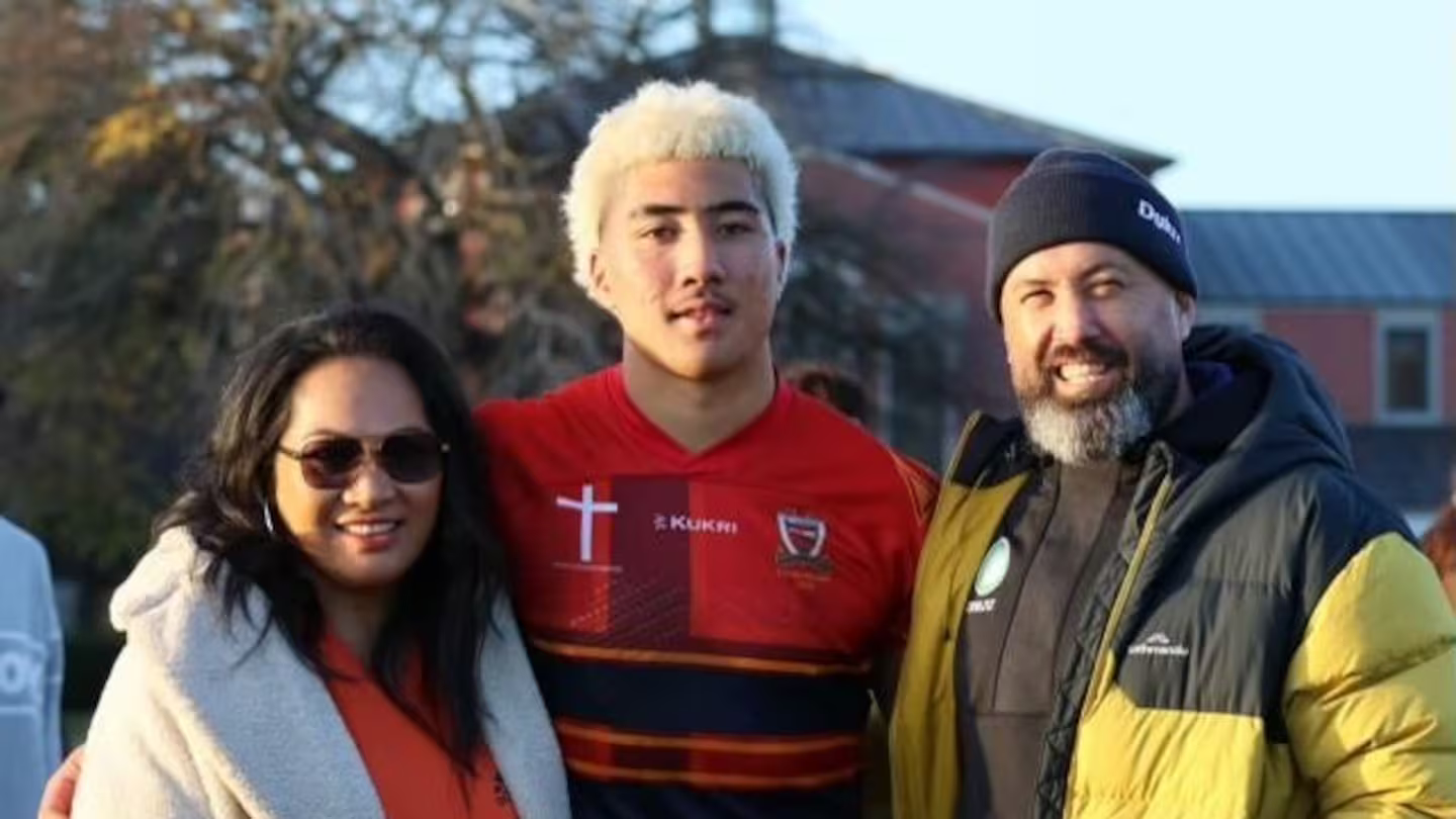 League sensation Bishop Neal with mother Betsy Neal and father Trevor Neal.